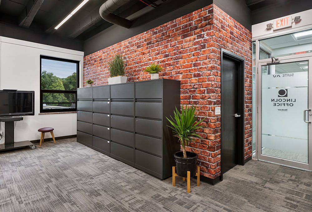 Acoustic wall printed with red brick texture