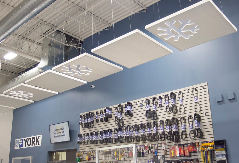 Acoustic canopies with decorative cut pattern