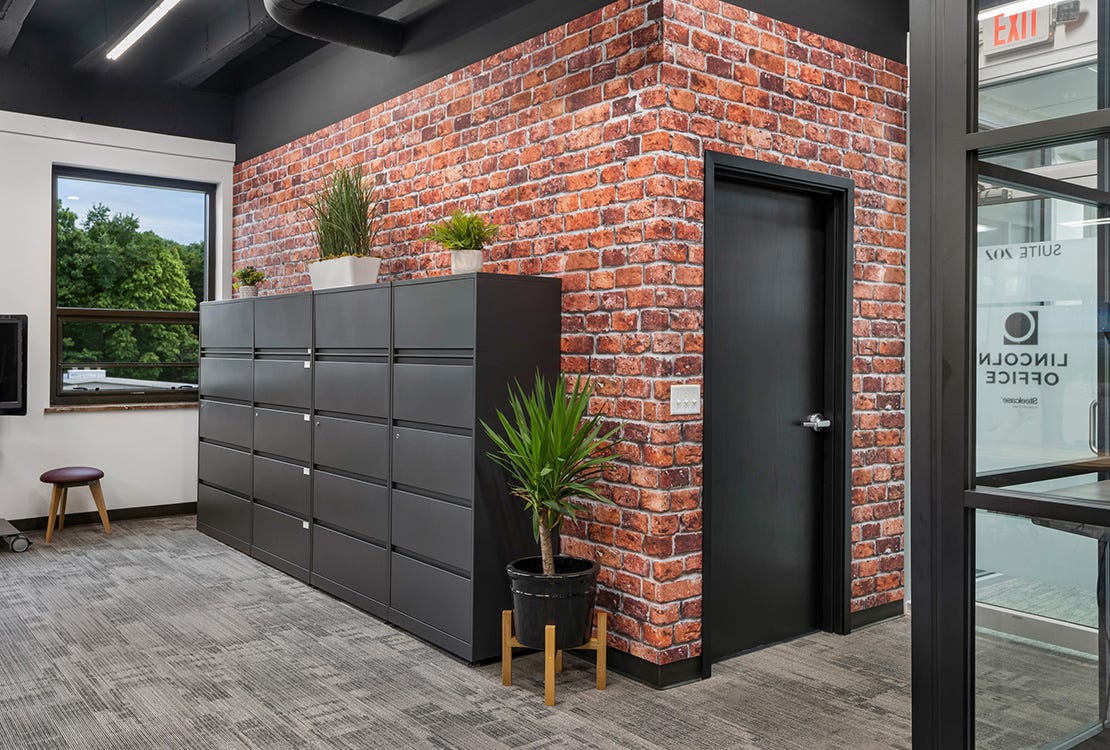 Acoustic wall printed with red brick texture