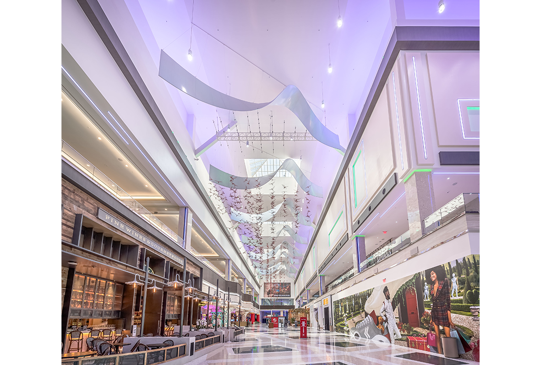 Suspended tension fabric ribbons in casino